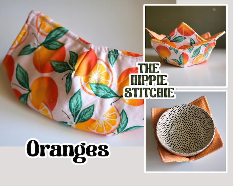 Peut inclure: Des dessous de plat faits &agrave; la main avec un motif d'oranges. Le tissu a un fond rose clair avec des oranges et des feuilles vertes. Le texte "Oranges" et "The Hippie Stichie" sont &eacute;galement visibles.