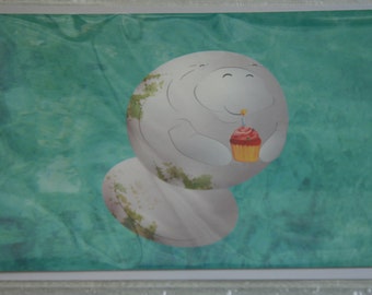 Manatee holding cupcake Happy Birthday greeting card