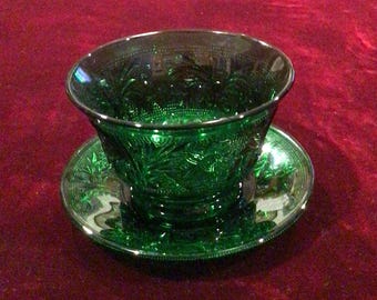 Vintage Forest Green Anchor Hocking Glass Cup and Saucer. Sold individually, four available. Plate is 4.4”, cup is 2.4” with 3.7” diameter.