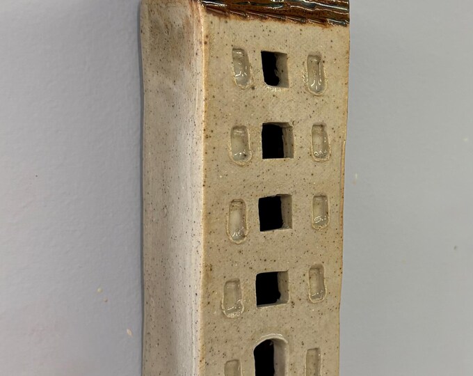 Stone ware wall hanging apartment building