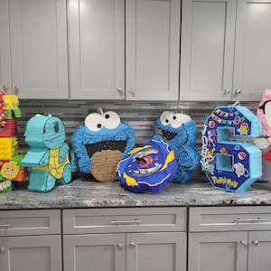Custom made piñatas!! Piñatas personalizadas!! Birthday piñatas!! Unique piñatas!!