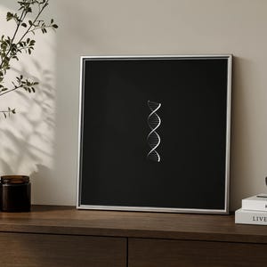 May include: A square wall art piece featuring a white DNA double helix illustration centered on a solid black background, enclosed within a thin silver frame. The minimalist design highlights the scientific structure against the dark backdrop.