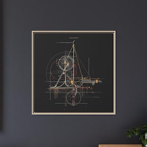 May include: Framed abstract art print featuring a complex geometric design in white, yellow, and red lines on a black background. The artwork includes circles, lines, and the word "ARCHITECTURAL" at the top. The print is in a gold frame.