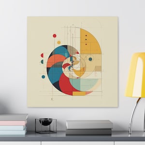 May include: A canvas print featuring an abstract geometric design. The artwork showcases a spiral composed of colorful shapes, including red, blue, and yellow, set against a cream background. Fine lines and dots add detail to the design.