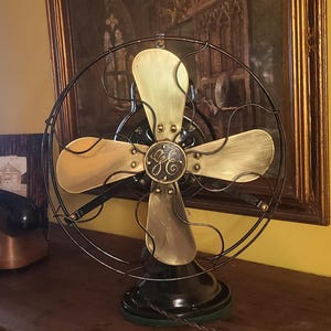 General Electric Brass Blade Oscillating Fan Cat. 75423