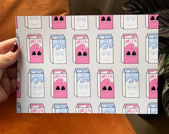 May include: A white background with a repeating pattern of cartoon milk cartons with different facial expressions. The cartons are blue and pink with the word "milk" printed on them.