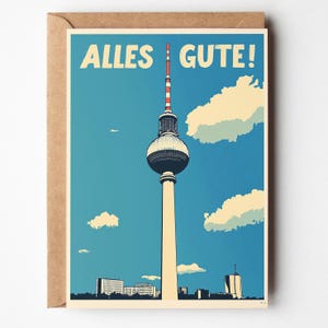 May include: A retro-style postcard featuring the Berlin Television Tower, a tall white tower with a red and white striped antenna, against a blue sky with white clouds. The postcard says "Alles Gute!" in bold white letters at the top.
