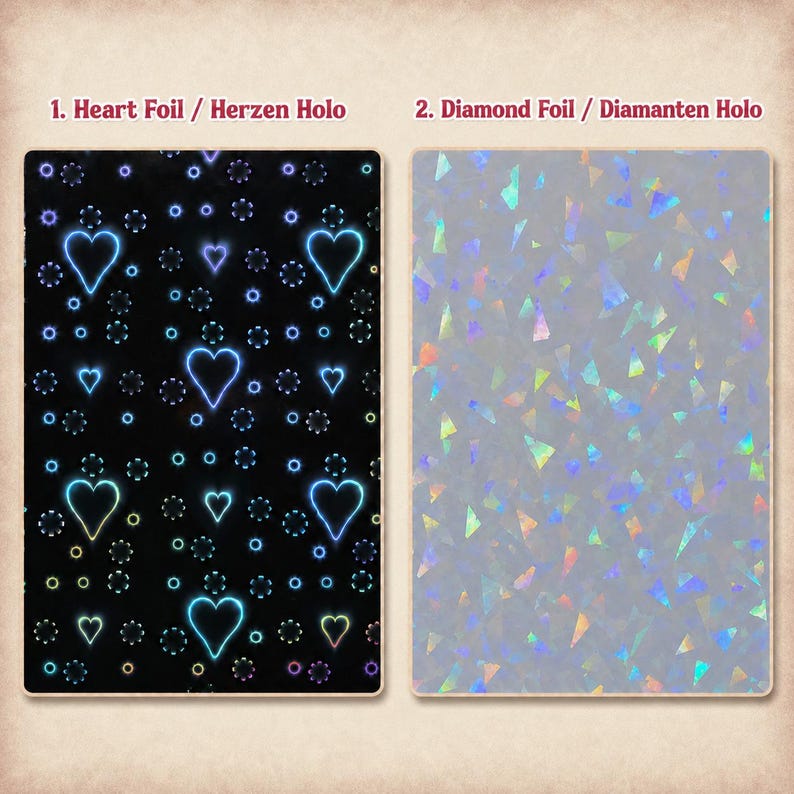May include: Two rectangular sheets of foil. The first sheet is black with a repeating pattern of glowing blue heart outlines and small circular accents labelled 1. Heart Foil. The second sheet is translucent with a holographic diamond pattern labelled 2. Diamond Foil.