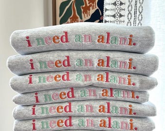 The original - I need an alani - Embrodiered Sweatshirt - Strawberry Sunrise inspired colors on a Gildan Ash sweatshirt
