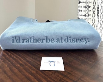 I’d rather be at the most magical place funny slogan sweatshirt - slogan sweatshirt - Gildan light blue