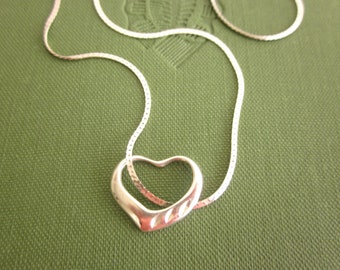 Sterling Silver floating heart charm necklace