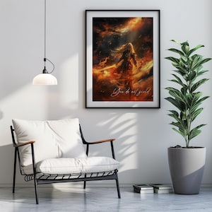 May include: A digital art print featuring a woman in armour standing in a fiery, celestial landscape. The text "You do not yield" is written in the bottom right corner.