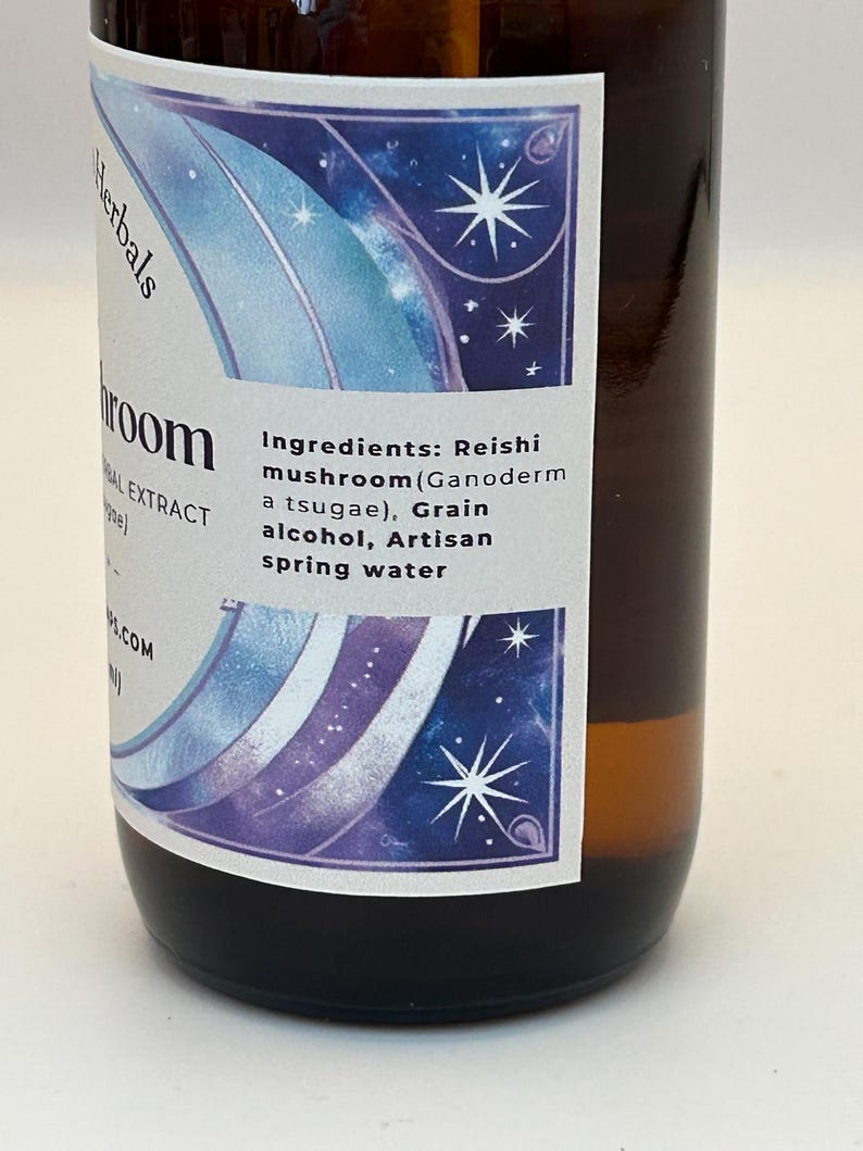 May include: A brown glass bottle with a white label featuring a blue and purple design with stars. The label reads "Herbals" and "Reishi mushroom (Ganoderm a tsugae), Grain alcohol, Artisan spring water".