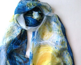 May include: A blue and yellow silk scarf with a swirling pattern reminiscent of a famous painting. The scarf is made of soft, lightweight fabric and is perfect for adding a touch of art to any outfit.