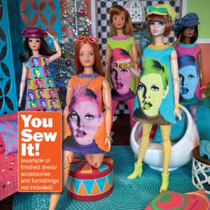 May include: A group of dolls wearing colourful, patterned dresses. The dolls are standing on a blue and orange patterned rug. The text "You Sew It! (example of finished dress/accessories and furnishings not included)" is printed on a red and white sign.