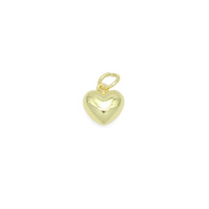 May include: A gold-colored heart-shaped charm with a loop for attaching to a necklace or bracelet.