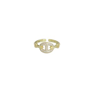 May include: Gold ring with a double circle design, featuring a pave setting of clear cubic zirconia stones.
