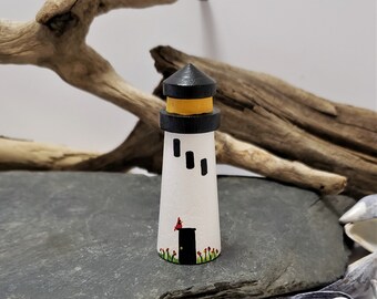 Miniature Lighthouse collectible, Cardinal, Red flowers, 2 3/4" tall