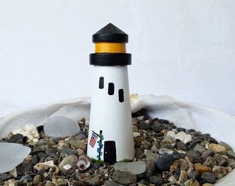 Miniature Lighthouse collectible with American Flag, 2 3/4" tall