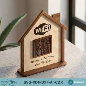 May include: Wooden house-shaped sign with a Wi-Fi symbol and a QR code. The sign reads "Welcome to Our Home Scan The Code" in elegant script. The sign is made of light-colored wood with darker brown trim.