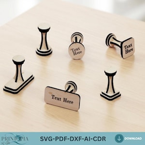 May include: A collection of wooden stamps with various shapes, including rectangular, circular, and geometric designs. Each stamp features a light-colored wooden base with black and white accents and the text "Text Here".