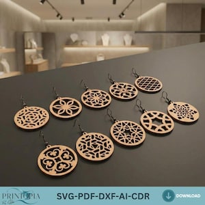 May include: A collection of laser-cut wooden earrings with various geometric and floral designs. The earrings are displayed on a dark surface, showcasing their intricate patterns and natural wood color. The image includes the text "PRINTIOPIA" and "SVG-PDF-DXF-AI-CDR".
