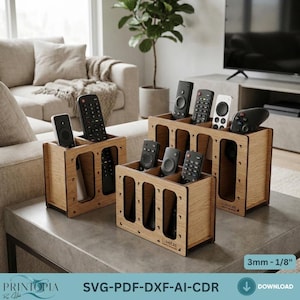 Puede incluir: Organizadores de control remoto de madera con múltiples compartimentos, que contienen varios controles remotos negros. Los organizadores son de madera clara y tienen un diseño moderno. El texto "LUMIERE" es visible en el lateral. El texto "3mm - 1/8" también es visible.