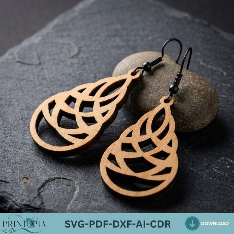 May include: A pair of wooden drop earrings with a geometric design. The earrings are light brown with black ear wires. The earrings are teardrop-shaped with an open, woven pattern. The text "SVG-PDF-DXF-AI-CDR" is visible at the bottom.