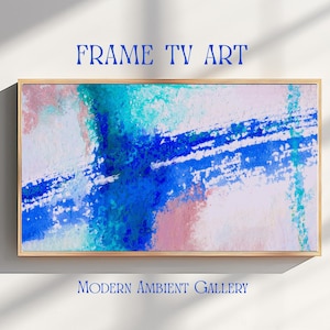 May include: Abstract art print in a gold frame. The artwork displays blue, pink, and teal brushstrokes on a white background. The text "FRAME TV ART" and "MODERN AMBIENT GALLERY" are displayed in blue.