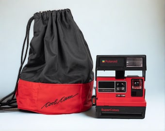 Red Polaroid 600 Supercolors/Cool Cam instant camera w/ matching backpack tote (serial VD7061B)