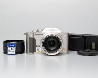 Panasonic Lumix DMC-FZ1 2 MP digicam w/ charger + battery + 1GB card