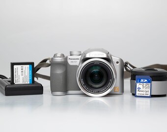 Panasonic Lumix DMC-FZ7 6 megapixel digicam feat. Leica Vario-Elmarit 1:2.8/6-72 lens w/ charger + battery + memory card