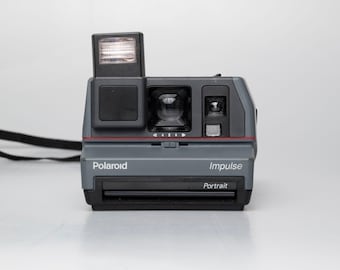Polaroid Impulse Portrait instant film camera (serial F1M38BCYNC)