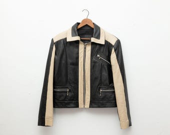 Cream and black leather jacket