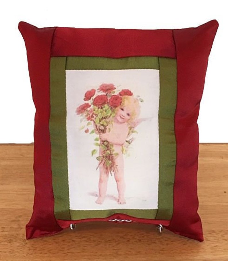 Baby Cupid Brings Flowers Pillow image 1