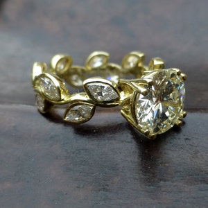 Leaf engagement ring design. White sapphire engagement ring. 14k yellow gold leaf ring. Marquis shaped white sapphires. image 3