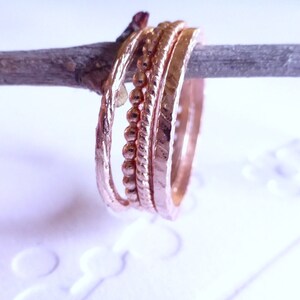 14k gold stacking ring set. Also available individually. Rose gold wedding bands. 14k pink gold textured bands. image 4