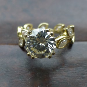 Leaf engagement ring design. White sapphire engagement ring. 14k yellow gold leaf ring. Marquis shaped white sapphires. image 2