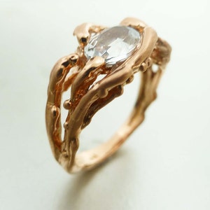 Modern Engagement ring. Unique engagement ring. 14k rose gold water ring. Oval white sapphire ring. image 3