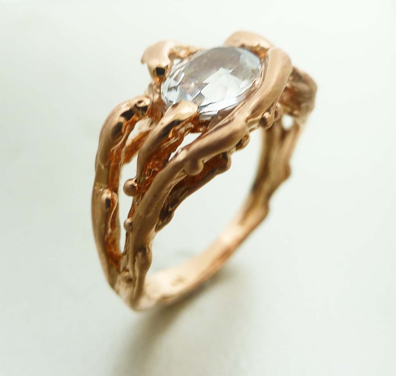 Modern Engagement ring. Unique engagement ring. 14k rose gold water ring. Oval white sapphire ring. image 3