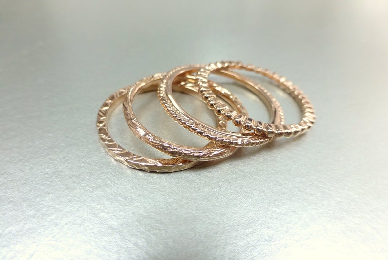 14k gold stacking ring set. Also available individually. Rose gold wedding bands. 14k pink gold textured bands. image 1