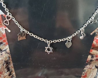 Pulsera con dijes de estrella de David de plata II