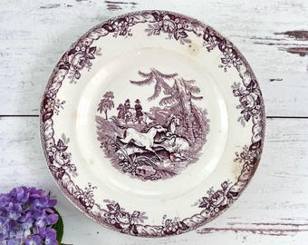 Purple transferware plate with wild horses. Mulberry mid 19th century