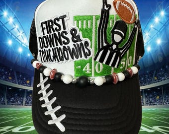 First Downs and Touchdowns Trucker Hat! with custom hat chain.