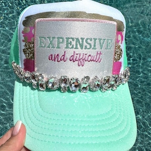 Expensive and Difficult trucker hat with bling hat chain.