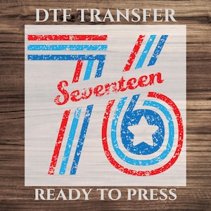 May include: DTF transfer with a distressed design featuring the text "Seventeen 76" in red and blue. The design includes red and blue stripes and a star within a circle, ready to press.