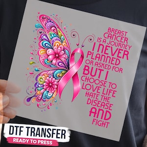 May include: A DTF transfer sheet featuring a colorful butterfly with intricate floral patterns and a pink breast cancer awareness ribbon. The text reads: BREAST CANCER IS A JOURNEY I NEVER PLANNED OR ASKED FOR BUT I CHOOSE TO LOVE LIFE HATE THE DISEASE AND FIGHT.