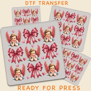 May include: DTF transfer sheets featuring cherubic angels with red wings and bows, along with pink hearts. The text "DTF TRANSFER" and "READY FOR PRESS" are printed on the image. These transfers are designed for fabric application.