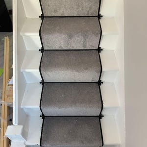 Grey stair runner with black whipped edge
