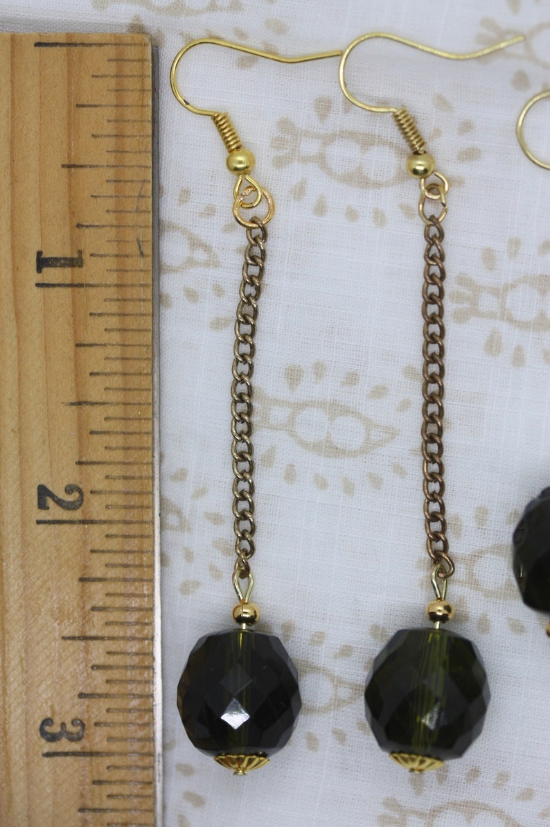 Your choice of handmade upcycled earrings findings and ear wires made of vintage faceted olive green dangles combined with new beads